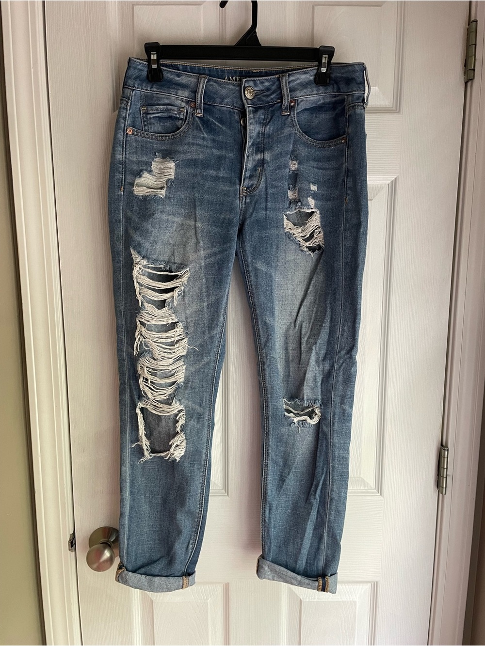 Distressed Women's Blue Denim Ripped Jeans